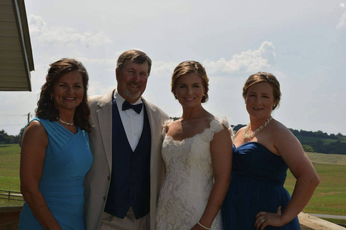 Randy Davis with family at a wedding on the farm